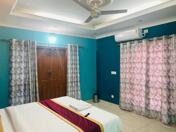 Relax Villa : photo 1 de la chambre chambre double avec balcon (2 adultes + 1 enfant)