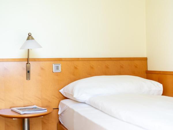 Hotel La Perla : photo 5 de la chambre chambre simple avec balcon