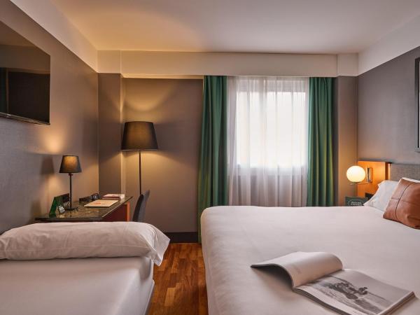 Hotel Malcom and Barret : photo 4 de la chambre chambre triple