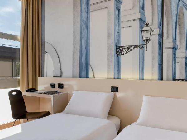 B&B Hotel Firenze City Center : photo 5 de la chambre chambre lits jumeaux