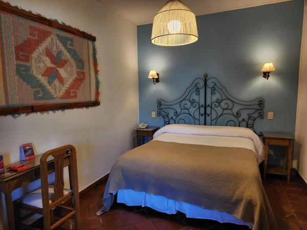 Hotel Boutique La Candela : photo 2 de la chambre appartement - vue sur piscine