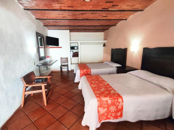 Hotel El Pescador : photo 4 de la chambre chambre lits jumeaux