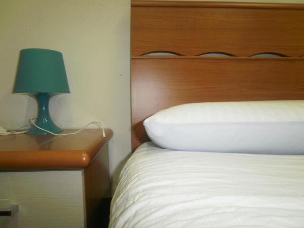 Guest House Erika : photo 6 de la chambre chambre double deluxe (2 adultes + 1 enfant)