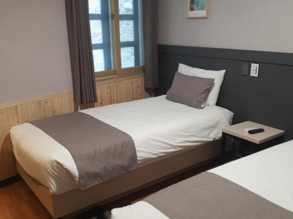 Ehwa In Myeongdong : photo 1 de la chambre chambre lits jumeaux