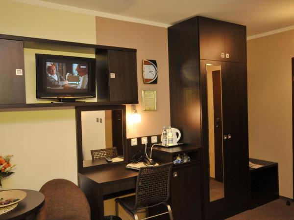 Apart A2 Bezobsługowy 24h Poznań : photo 4 de la chambre chambre triple avec salle de bains privative