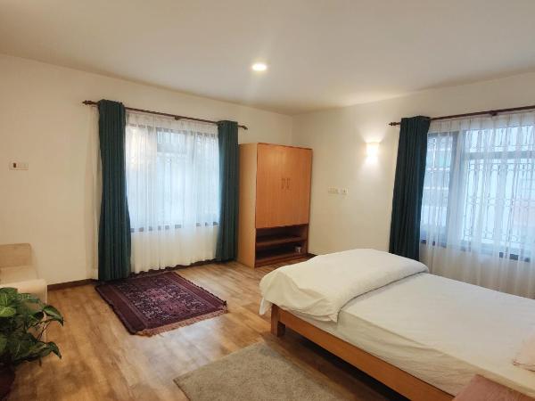 Nextdoor Kathmandu : photo 5 de la chambre appartement - vue sur jardin