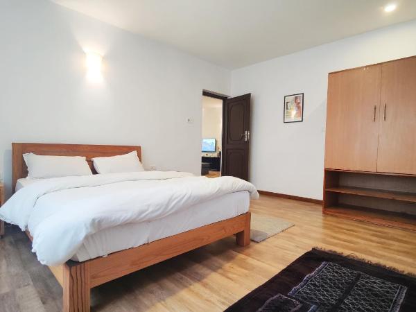 Nextdoor Kathmandu : photo 7 de la chambre appartement - vue sur jardin