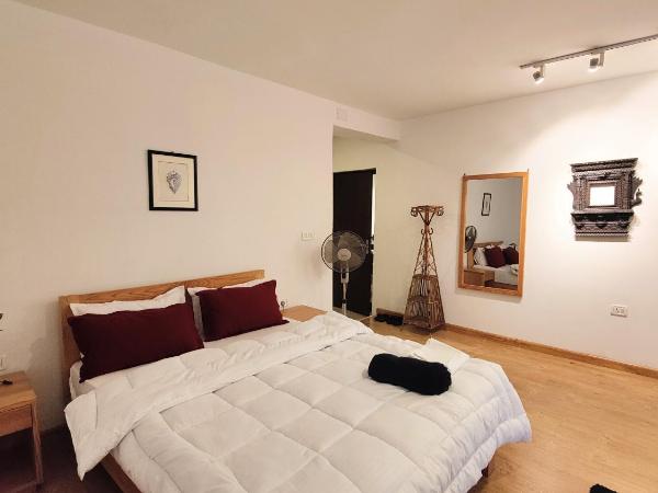 Nextdoor Kathmandu : photo 2 de la chambre suite - vue sur jardin