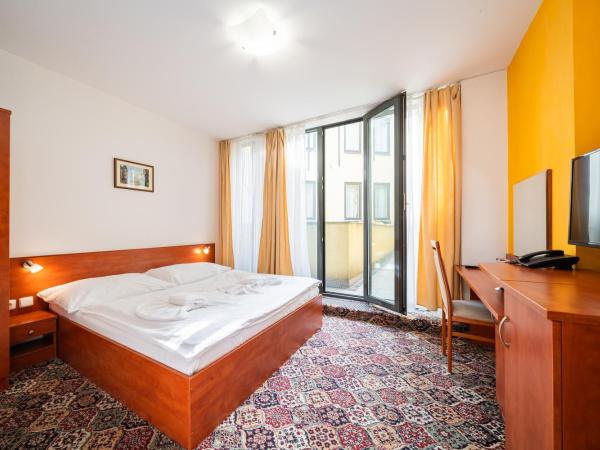 City Central De Luxe : photo 8 de la chambre chambre double ou lits jumeaux (1 adulte)