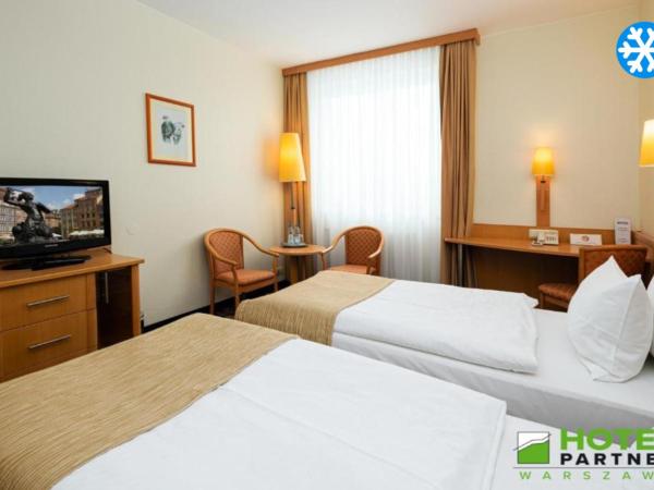 Hotel Partner : photo 6 de la chambre chambre lits jumeaux