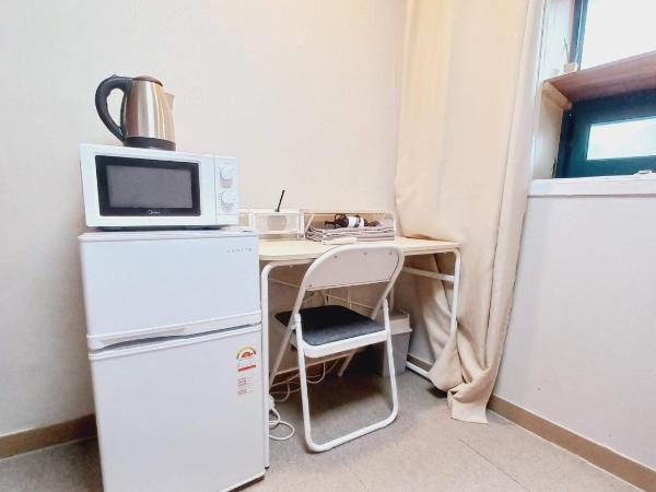 Sujeongjang Inn : photo 10 de la chambre chambre simple avec salle de bains privative