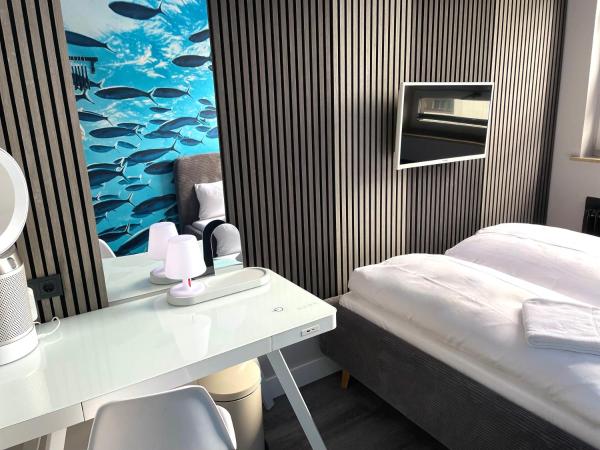 CitySurfer44 : photo 4 de la chambre chambre double avec salle de bains commune