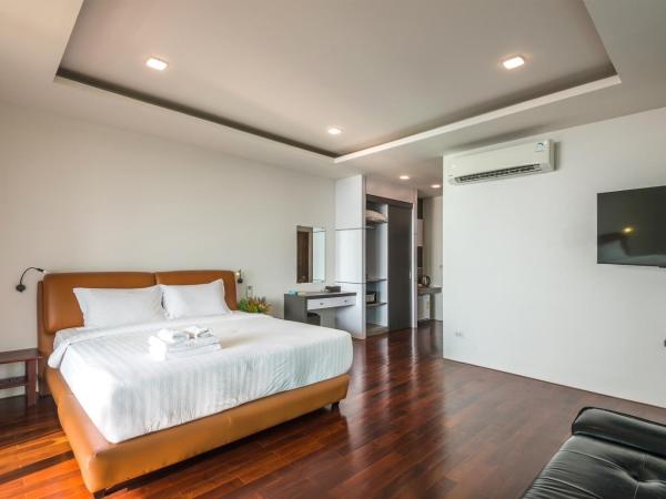 Phi Phi Mountain Beach Resort SHA Certified : photo 1 de la chambre chambre de luxe avec vue sur l'océan