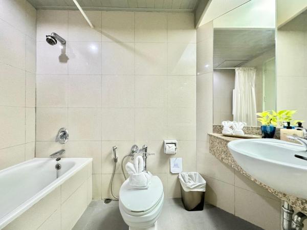 Phuket Merlin Hotel : photo 5 de la chambre chambre deluxe double ou lits jumeaux