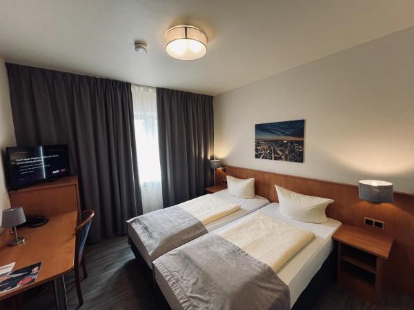 Hotel Niederräder Hof : photo 1 de la chambre chambre double