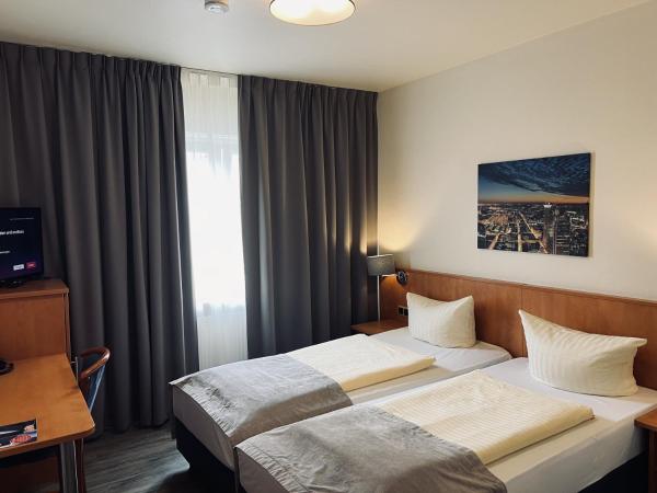 Hotel Niederräder Hof : photo 2 de la chambre chambre double