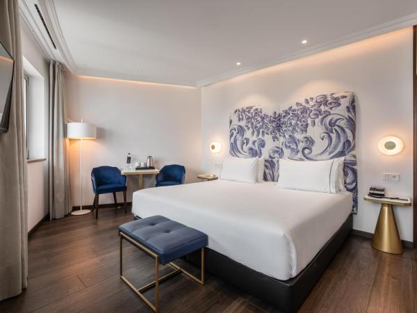 Eurostars Universal Lisboa : photo 2 de la chambre chambre double ou lits jumeaux deluxe - vue sur rivière