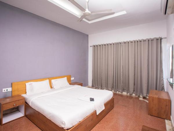 Stayz Inn Mylapore near light house : photo 2 de la chambre chambre double deluxe - vue latérale sur mer