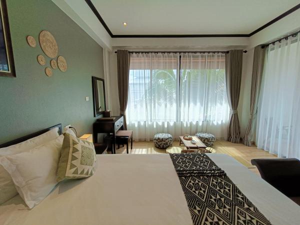 THEE Kashatharn by TH District : photo 1 de la chambre chambre double ou lits jumeaux deluxe - vue sur piscine