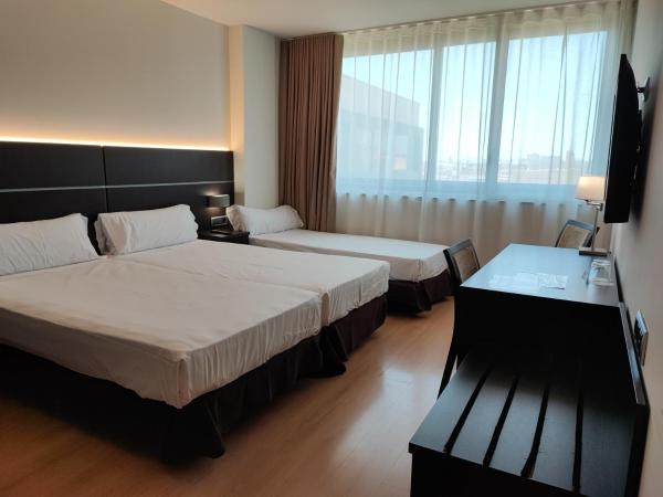 Tarraco Park Tarragona : photo 1 de la chambre chambre triple