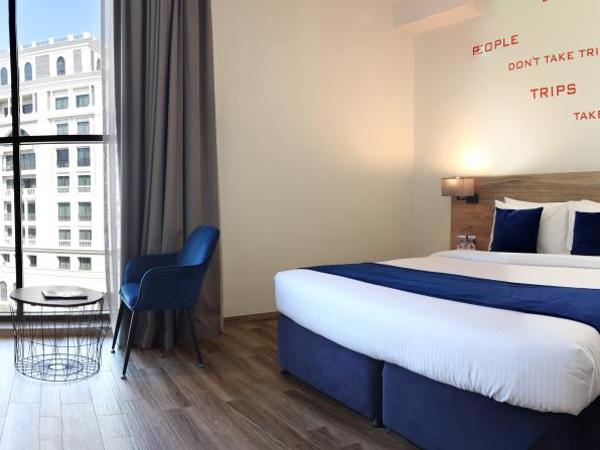 Grand Kingsgate Jaddaf Waterfront Hotel by Millennium : photo 5 de la chambre executive room waterfront view with sofa bed