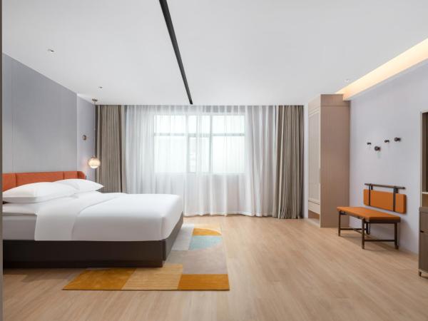 Home2 Suite by Hilton Dongguan Shijie : photo 1 de la chambre chambre lit king-size deluxe