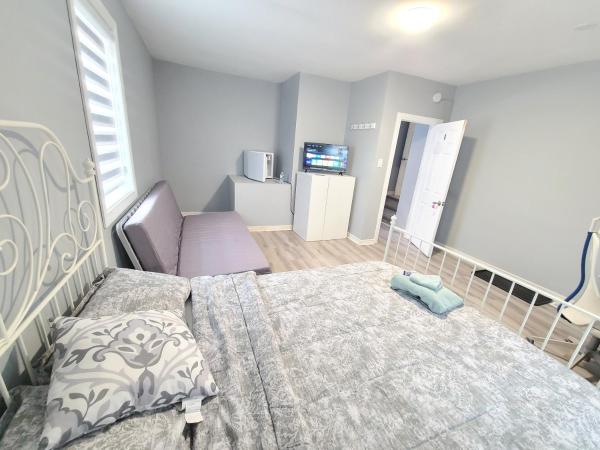 Cloud Bnb Downtown Ottawa : photo 7 de la chambre chambre lit queen-size