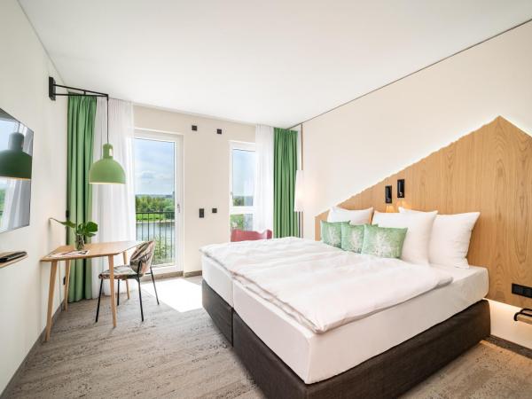 ARCOTEL HafenCity Dresden : photo 3 de la chambre chambre double ou lits jumeaux supérieure