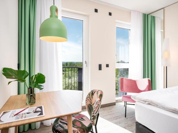 ARCOTEL HafenCity Dresden : photo 5 de la chambre chambre double ou lits jumeaux supérieure