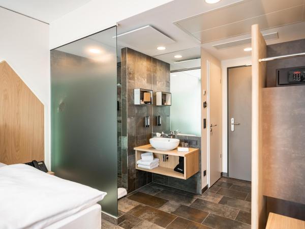 ARCOTEL HafenCity Dresden : photo 6 de la chambre chambre double ou lits jumeaux supérieure