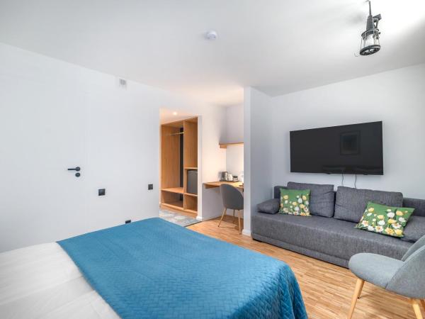 Grand Tulipan : photo 2 de la chambre chambre double avec lit d'appoint