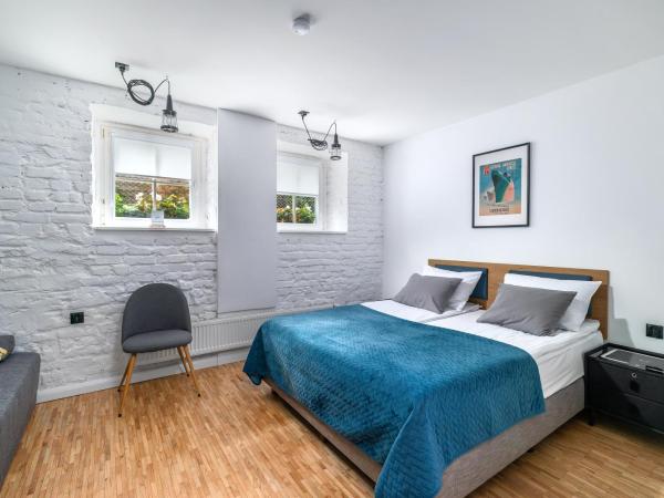 Grand Tulipan : photo 1 de la chambre chambre double avec lit d'appoint