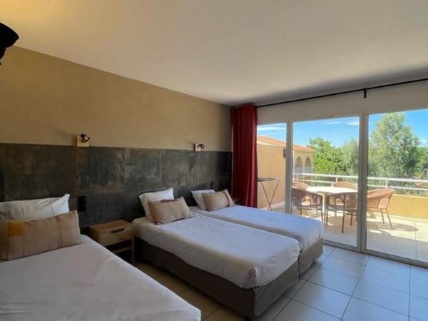 Hôtel Le Maritime : photo 6 de la chambre suite familiale avec terrasse