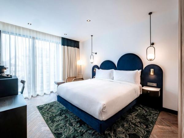 Doubletree By Hilton Nice Centre Iconic : photo 3 de la chambre chambre lit king-size - vue sur ville
