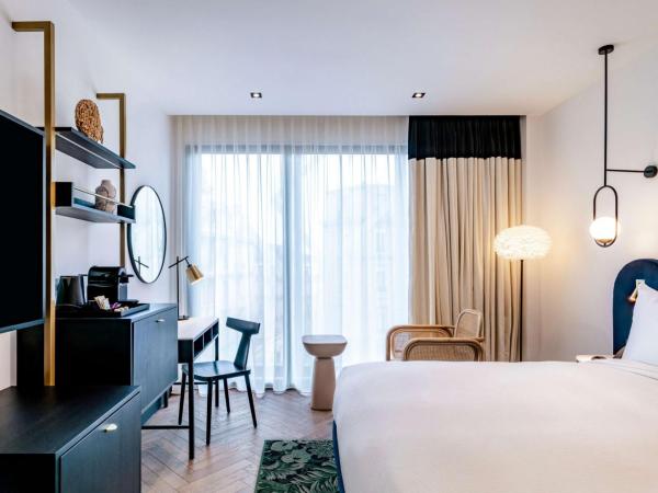 Doubletree By Hilton Nice Centre Iconic : photo 3 de la chambre chambre lit queen-size - vue sur ville