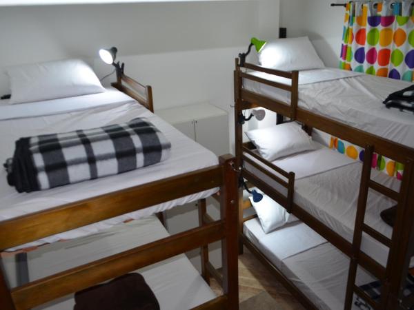 HostelariaSP Boutique : photo 1 de la chambre chambre lits jumeaux avec salle de bains commune