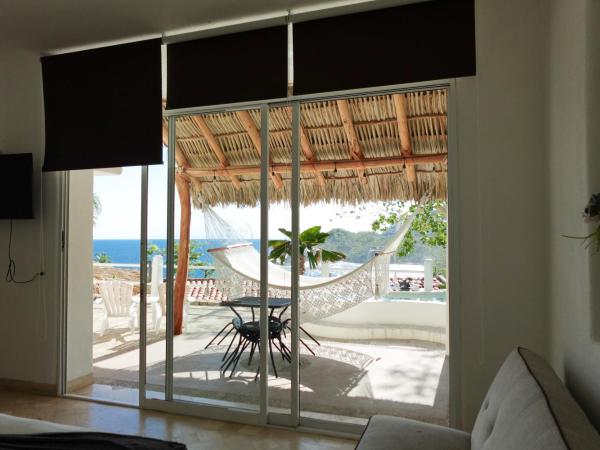 Villa de Reyes Hotel Boutique : photo 8 de la chambre chambre lit king-size - vue sur mer