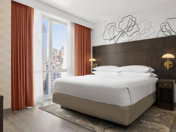 Courtyard by Marriott New York Manhattan/Chelsea : photo 3 de la chambre suite lit king-size
