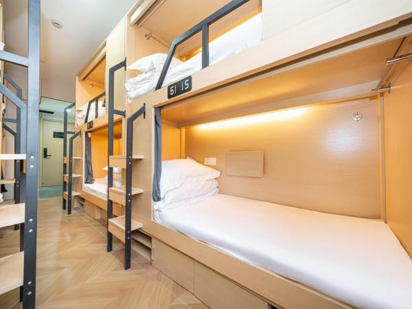 Denpa Inn - Zhenbei Subway Station Meichuan Road Pedestrian Street Branch : photo 6 de la chambre bed in 8-bed male dormitory room - shared bathroom