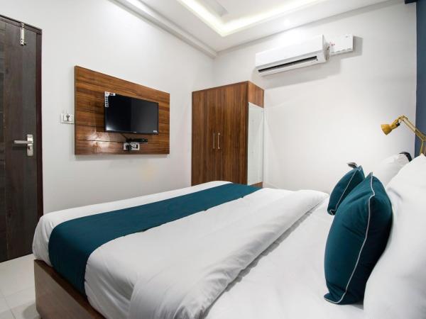 Collection O Hotel Blue Shine : photo 9 de la chambre chambre double standard