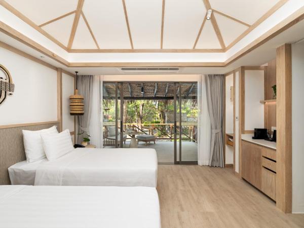 SAii Phi Phi Island Village : photo 1 de la chambre villa 2 lits jumeaux deluxe avec jardin
