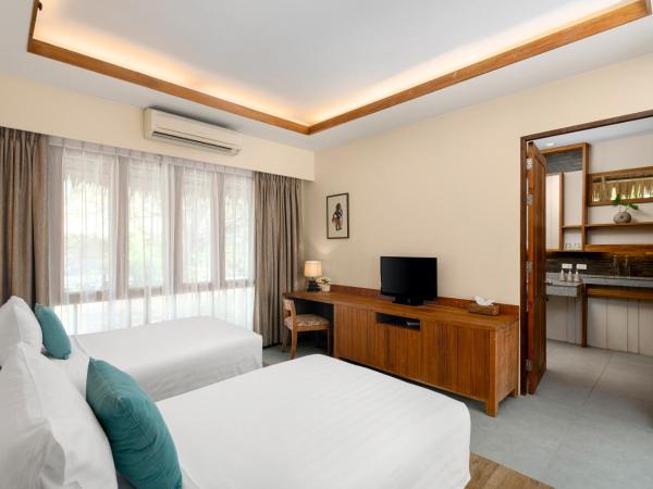 SAii Phi Phi Island Village : photo 3 de la chambre bungalow 2 lits jumeaux deluxe - côté jardin