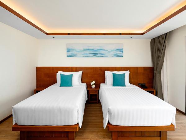 SAii Phi Phi Island Village : photo 4 de la chambre bungalow 2 lits jumeaux deluxe - vue sur mer