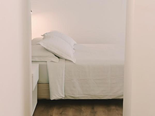 Ibiscus Hotel : photo 10 de la chambre chambre triple - vue sur jardin