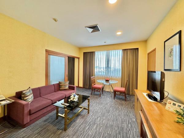 Phuket Merlin Hotel : photo 3 de la chambre suite junior