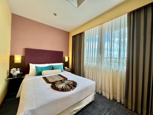 Phuket Merlin Hotel : photo 1 de la chambre suite junior