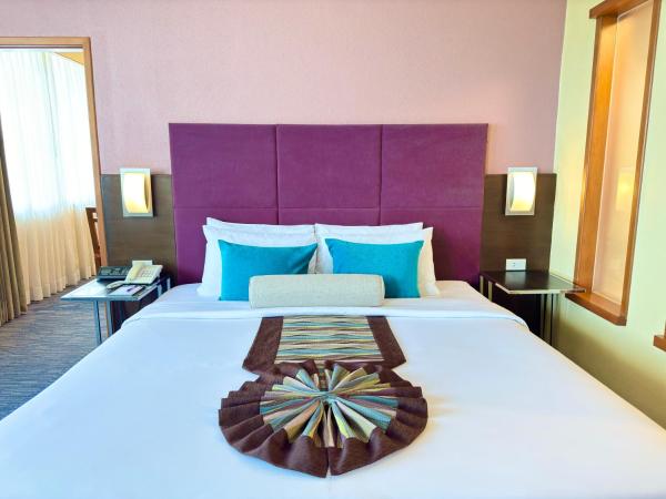 Phuket Merlin Hotel : photo 3 de la chambre suite exécutive