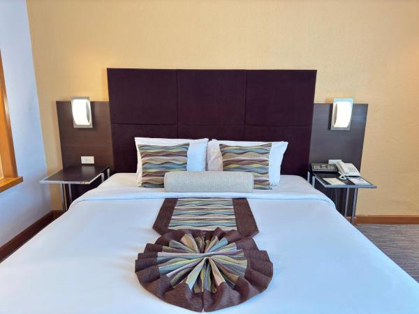 Phuket Merlin Hotel : photo 10 de la chambre suite familiale