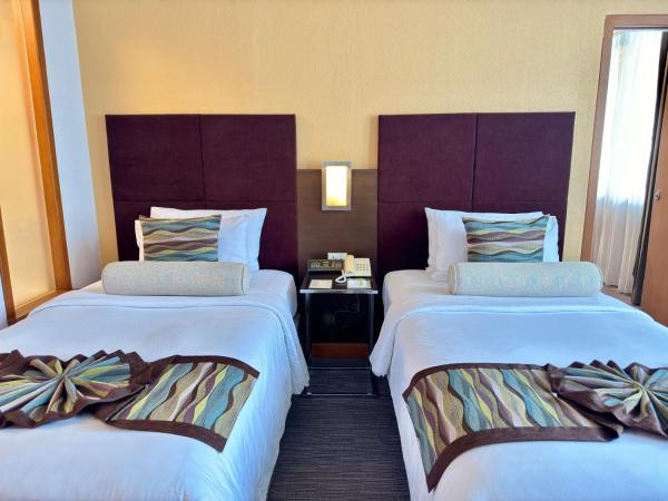 Phuket Merlin Hotel : photo 8 de la chambre suite familiale
