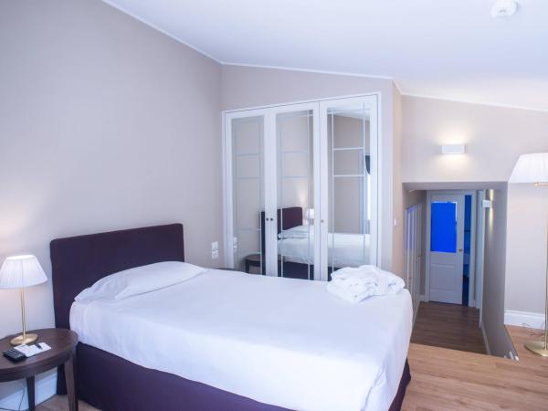 Palazzo Castri 1874 Hotel & Spa : photo 2 de la chambre appartement - vue sur jardin